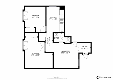 A floor plan of a home with a kitchen, living room, and two bedrooms.